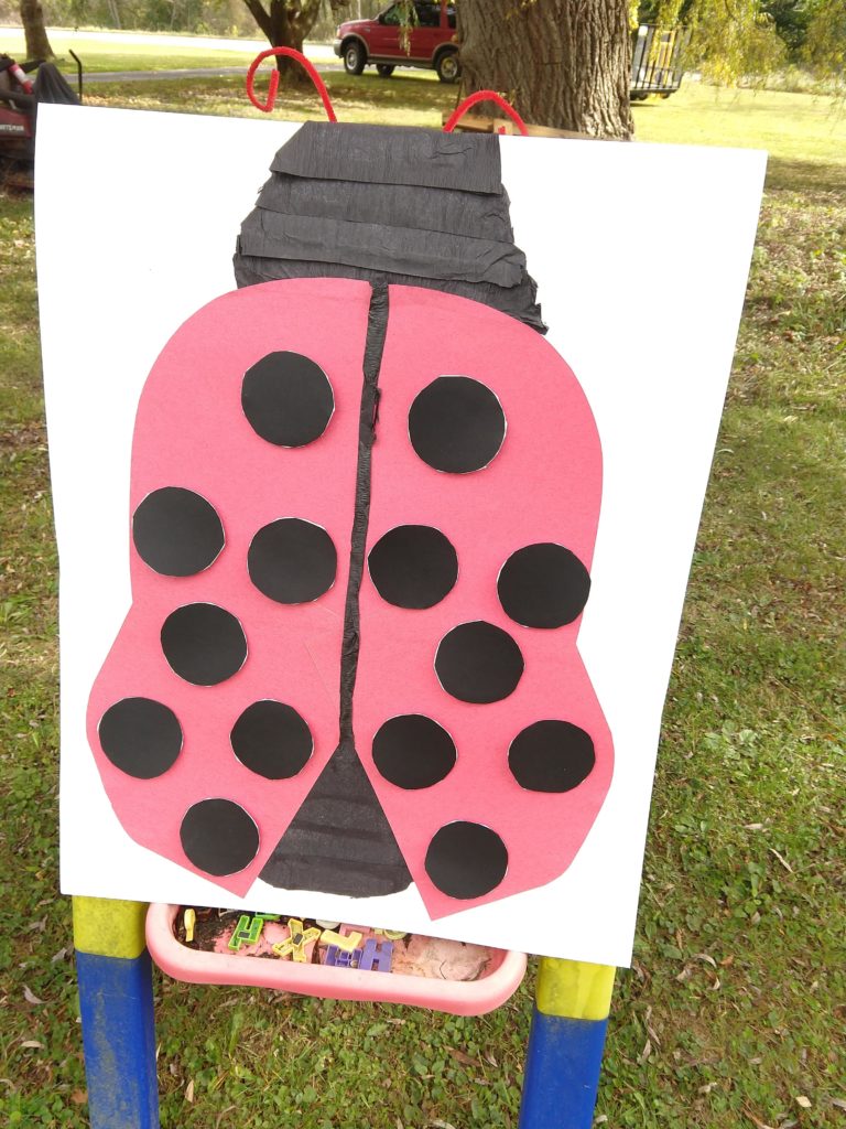 activity for our bug-themed birthday party Pin the dots on the ladybug